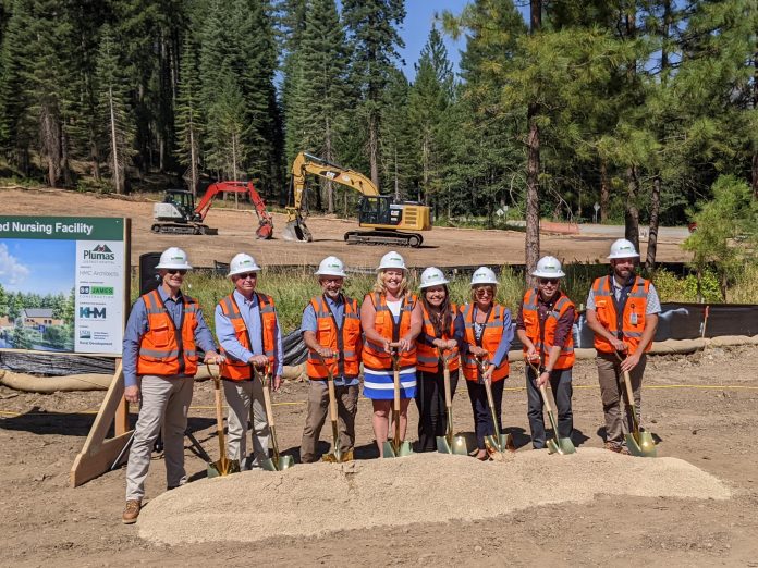 Leaders prepare for the ceremonial turning of the dirt for the new Plumas District Hospital skilled nursing facility. From left: Josh Walker, general superintendent, S+B James Construction; Bill Wickman, board president, PDH; Jeffrey Kepple, doctor and former chief executive officer, PDH; JoDee Read, CEO, PDH; Maria Gallegos Herrera, California state director, United States Department of Agriculture; Lisa Butler, Community Facilities Program director, USDA; Darren Beatty, chief operating officer, PDH; Hayden Meyers, senior project manager, S+B James Construction. Photos by Ingrid Burke