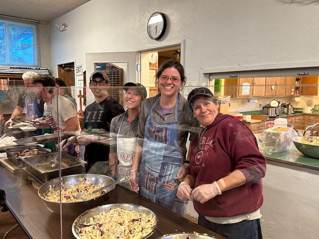 Mount Hough Ranger District personnel prepare to serve the Oct. 11 Quincy Community Supper. Photo courtesy Quincy Community Supper