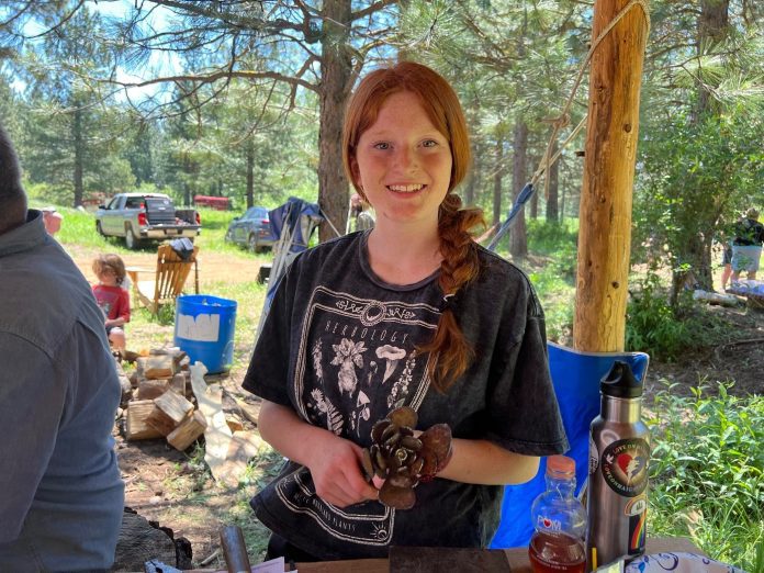 Aislynn McGinley tries her hand at metal crafting during Nature Made Kids Camp. Photos courtesy Plumas Rural Services